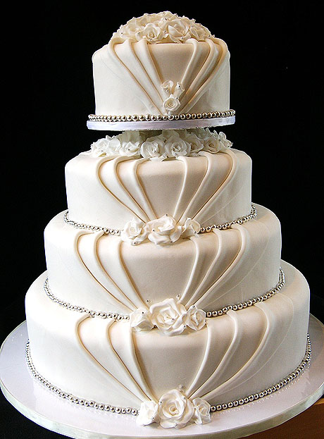 Elegant Wedding Cake with Roses and Silver Accents