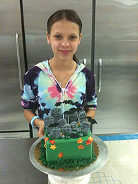 Student with cake